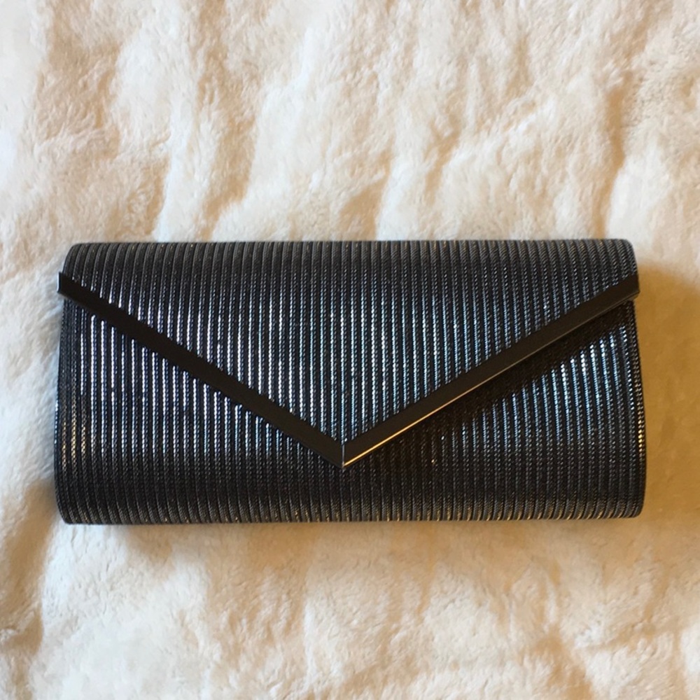 3 for $30 Beautiful clutch purse with detachable chain handle. Silver and black.